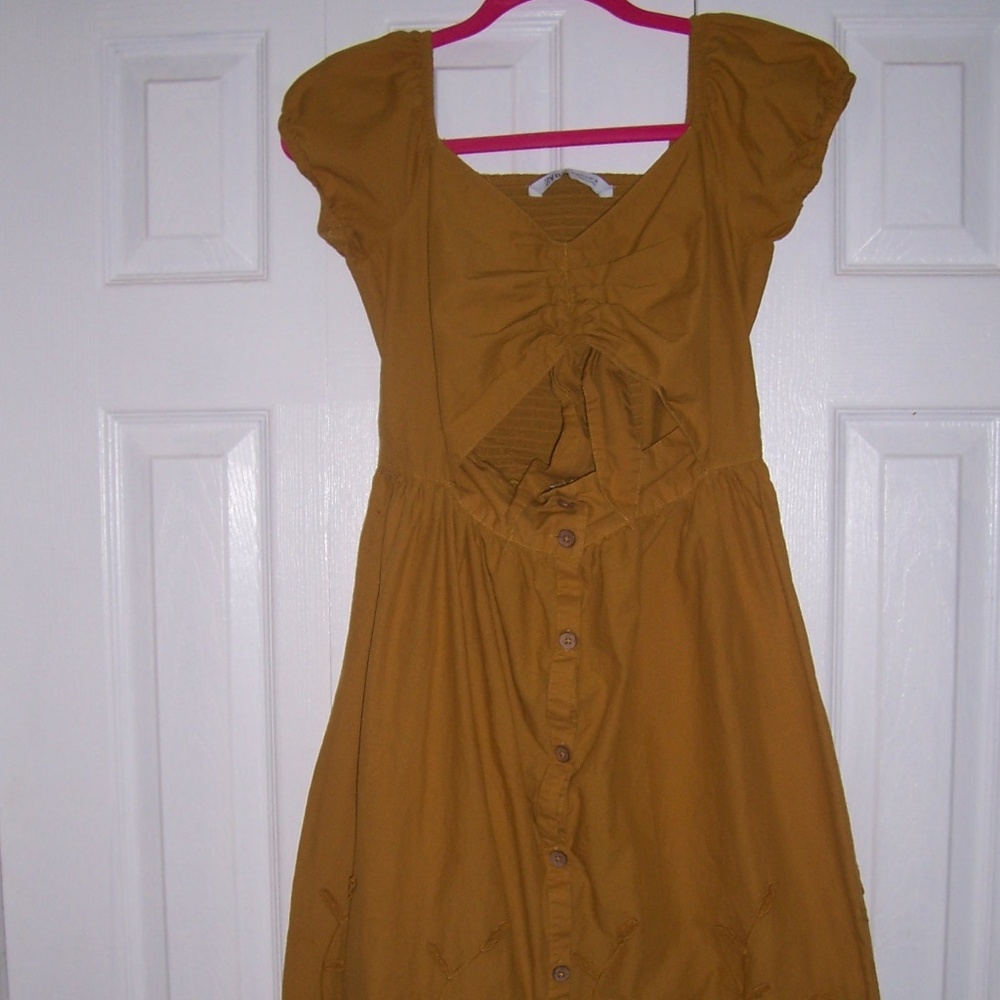 long dress out, mustard yellow